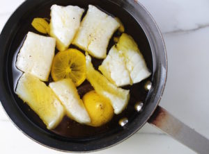 poached cod in olive oil