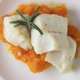 poached cod on plate